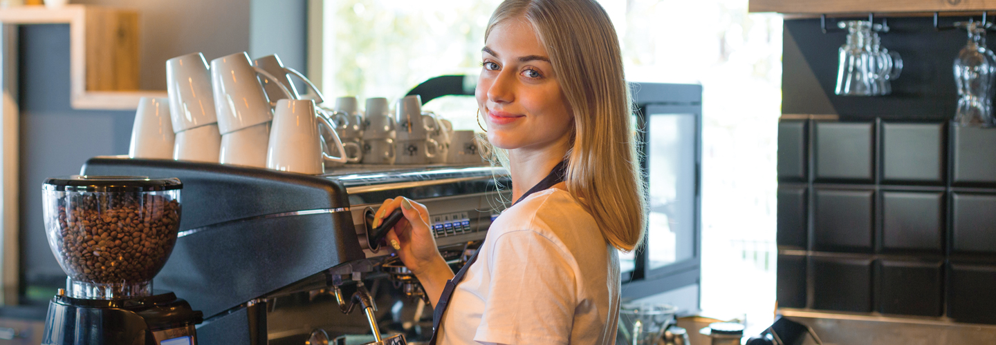 Photo of a teen working as a barista