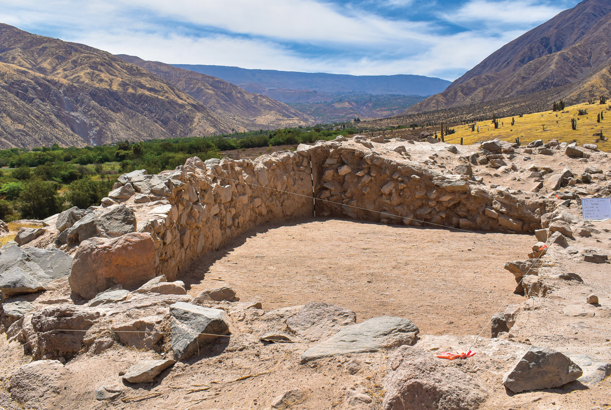 Image of ancient ruins with mountains in the background