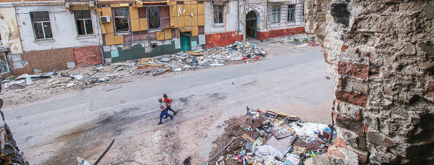 Photo from a destroyed building in Ukraine and the destroyed city street below