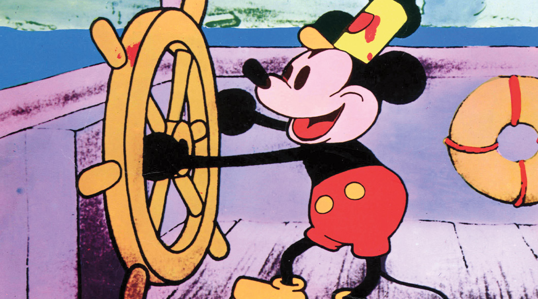 Colorized cartoon of Mickey Mouse steering a boat